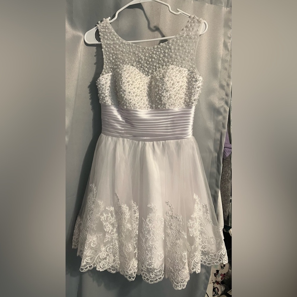 Elegant White Dress with Pearl Embellishments